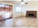 Spacious living area with tile floors and sliding glass doors at 4684 Trevins Ave, Las Vegas, NV 89103