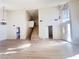 Two story high ceiling living room with hardwood floors and staircase at 4684 Trevins Ave, Las Vegas, NV 89103