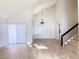 Bright and spacious living room with high ceilings, hardwood floors and a chandelier at 4684 Trevins Ave, Las Vegas, NV 89103