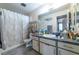 Bathroom with shower/tub combo and vanity at 5261 Lindell Rd # 205, Las Vegas, NV 89118