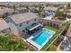 Aerial view of house with pool, spa, and backyard oasis at 5310 Esparon Ave, Las Vegas, NV 89141