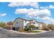 Two-story house with a two-car garage, nicely landscaped at 5310 Esparon Ave, Las Vegas, NV 89141
