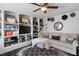 Cozy sitting room with built-in shelving and comfortable seating at 5310 Esparon Ave, Las Vegas, NV 89141