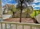 Landscaped backyard with trees, gravel, and a hockey net at 6225 Dan Blocker Ave # 102, Henderson, NV 89011