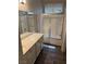 Bright bathroom showcasing a shower-over-tub combination and vanity at 6225 Dan Blocker Ave # 102, Henderson, NV 89011