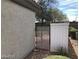 This property features a small side yard with desert landscaping at 6225 Dan Blocker Ave # 102, Henderson, NV 89011