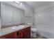 Bathroom features granite countertop and a tub shower at 6800 E Lake Mead Blvd # 2035, Las Vegas, NV 89156