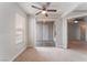 Bedroom with patio access and ceiling fan at 6800 E Lake Mead Blvd # 2035, Las Vegas, NV 89156