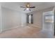 Bright bedroom with ceiling fan and window at 6800 E Lake Mead Blvd # 2035, Las Vegas, NV 89156