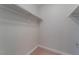 Spacious walk-in closet with ample shelving at 6800 E Lake Mead Blvd # 2035, Las Vegas, NV 89156