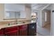 Modern kitchen with granite countertops and dark wood cabinets at 6800 E Lake Mead Blvd # 2035, Las Vegas, NV 89156