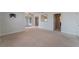 Spacious living room with access to kitchen and patio at 6800 E Lake Mead Blvd # 2035, Las Vegas, NV 89156