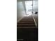 Carpeted staircase leading to the upper level of the home at 703 Greenbriar Townhouse Way, Las Vegas, NV 89121