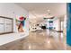 Bright lobby featuring modern art and comfortable seating at 8925 W Flamingo Rd # 216, Las Vegas, NV 89147