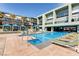 Resort-style pool with plenty of lounge chairs at 8925 W Flamingo Rd # 216, Las Vegas, NV 89147