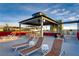 Relaxing rooftop deck with lounge chairs and seating at 8925 W Flamingo Rd # 216, Las Vegas, NV 89147