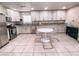 Updated kitchen featuring granite counters and stainless steel appliances at 9552 Wooden Pier Way, Las Vegas, NV 89117