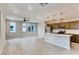 Modern kitchen with island and stainless steel appliances at 11297 Hidden Peak Ave # 102, Las Vegas, NV 89135