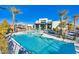 Inviting swimming pool with a spa and lounge chairs at 11297 Hidden Peak Ave # 102, Las Vegas, NV 89135