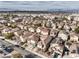 Wide aerial view showing the house among other homes, highlighting its neighborhood setting at 1324 Spice Ridge Ct, Henderson, NV 89012