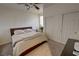 Bedroom with a ceiling fan and double sliding door closet at 1771 Labrador St, Pahrump, NV 89048