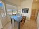 Inviting breakfast nook with lots of natural light and views to the outside at 1771 Labrador St, Pahrump, NV 89048