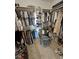 Walk-in closet with ample storage space and organization system at 1771 Labrador St, Pahrump, NV 89048
