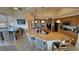 Bright kitchen featuring granite countertops, stainless appliances, and large center island at 1771 Labrador St, Pahrump, NV 89048