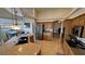 Open-concept kitchen featuring stainless steel appliances and granite countertops at 1771 Labrador St, Pahrump, NV 89048
