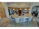 Charming kitchen with a large island, stainless steel appliances, and lots of counter space at 1771 Labrador St, Pahrump, NV 89048