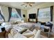 Cozy living room offers a spacious sectional and windows with mountain views at 1771 Labrador St, Pahrump, NV 89048