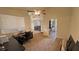 Spacious living room with a ceiling fan and plenty of natural light at 1771 Labrador St, Pahrump, NV 89048