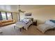 This main bedroom offers natural light, ample space, and comfortable seating areas at 1771 Labrador St, Pahrump, NV 89048