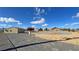 Vast property showcasing ample space, storage building, and potential for various outdoor activities at 1771 Labrador St, Pahrump, NV 89048