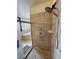 Walk-in shower featuring multiple shower heads and controls at 1771 Labrador St, Pahrump, NV 89048