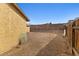 View of the backyard with fencing and house exterior at 204 Cimarron Ct, Henderson, NV 89002