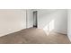 Bedroom with neutral walls, plush carpeting, closet, and natural lighting at 204 Cimarron Ct, Henderson, NV 89002