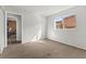 Bedroom with neutral walls, carpet, and window for natural light at 204 Cimarron Ct, Henderson, NV 89002