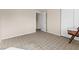 Bedroom featuring patterned carpet, white walls, a closet, and natural lighting at 204 Cimarron Ct, Henderson, NV 89002
