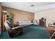 Cozy living room with neutral paint and a fireplace provides a warm and inviting atmosphere at 204 Cimarron Ct, Henderson, NV 89002