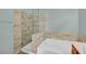 Updated bathroom with tiled shower over tub and glass surround at 2050 W Warm Springs Rd # 3322, Henderson, NV 89014