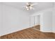 Bedroom with a ceiling fan, wood-look flooring, and closet with sliding doors at 2050 W Warm Springs Rd # 3322, Henderson, NV 89014