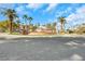 Exterior street view of luxury homes with mature landscaping and paver streets at 2050 W Warm Springs Rd # 3322, Henderson, NV 89014