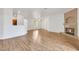 Bright and open living room with a fireplace, ceiling fan, and hardwood floors that provides a cozy atmosphere at 2050 W Warm Springs Rd # 3322, Henderson, NV 89014