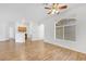Open-concept living room featuring wood floors and ample natural light at 2050 W Warm Springs Rd # 3322, Henderson, NV 89014