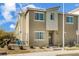 Charming townhouse featuring neutral tones, a welcoming entryway, and well-kept landscaping at 2681 Tuxedo Black Ct, North Las Vegas, NV 89086