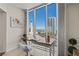 Breakfast nook featuring a spacious desk and floor-to-ceiling windows with city views at 2777 Paradise Rd # 1105, Las Vegas, NV 89109