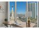 Breakfast nook featuring a spacious desk and floor-to-ceiling windows with city views at 2777 Paradise Rd # 1105, Las Vegas, NV 89109