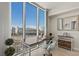 Breakfast nook featuring a spacious desk and floor-to-ceiling windows with city views at 2777 Paradise Rd # 1105, Las Vegas, NV 89109