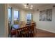 Bright dining room featuring wood table, matching chairs, art, and floor to ceiling windows with city views at 2777 Paradise Rd # 1105, Las Vegas, NV 89109
